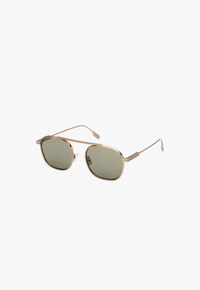 Gold metal-framed sunglasses with rectangular green-tinted lenses and thin temples on a white background.