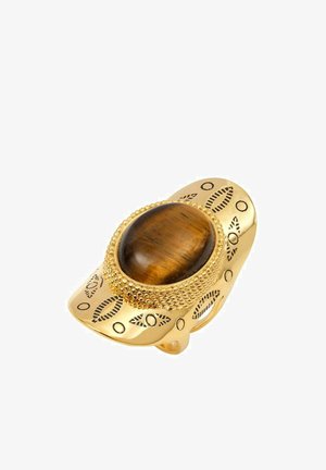 Bague en or avec une pierre ovale en œil de tigre, ornée d'accents en perles et de motifs de feuilles gravés sur un large band.