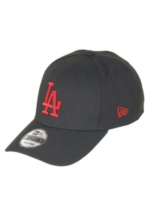 Black baseball cap featuring a raised red "LA" logo on the front. Constructed from textile material, with a curved brim and adjustable strap.