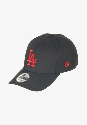 Black baseball cap featuring a raised red "LA" logo on the front. Constructed from textile material, with a curved brim and adjustable strap.