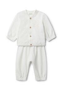 Bílý dvoudílný outfit pro miminko, který obsahuje sako na patentky s elastickými manžetami a kalhoty se shodným elastickým pasem. Vyšívané detaily králíčka.