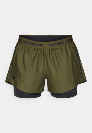 Green athletic shorts with a black waistband featuring "UNDER ARMOUR" lettering. Includes black inner shorts for added support and coverage.