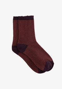 Sélectionné, aubergine