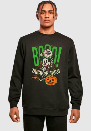 Sudadera negra con un gráfico que dice "Boo!" y "Trick or Treat", que muestra a un esqueleto de Mickey Mouse, una araña y una calabaza de Halloween.