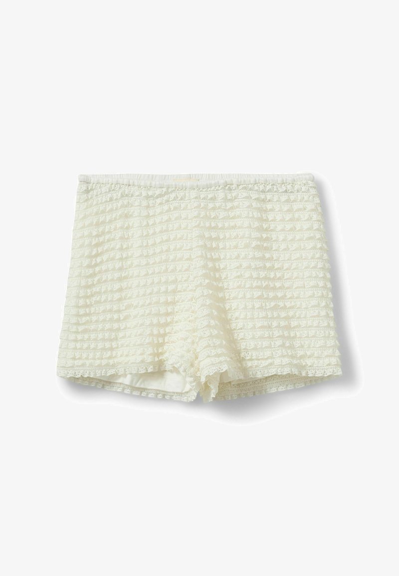 Shorts en dentelle blanche avec volants superposés et taille élastique, présentés à plat sur un fond blanc.