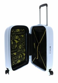 Valise à coque rigide de cabine en bleu clair, avec un intérieur noir à motif jaune, poignée rétractable et roues multidirectionnelles.