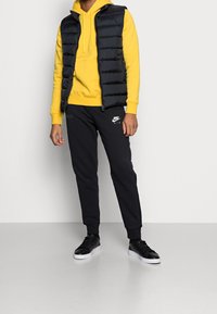 Nike Sportswear Luvtröja - dark yellow