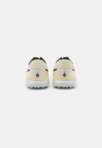 Nike Performance TIEMPO LEGEND 10 ACADEMY TF - Turf football boots - lemonade/black/metallic gold coin