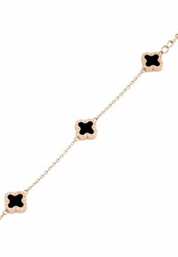 Bracciale dorato con tre maglie a forma di trifoglio dotate di inserti in smalto nero. Delicata catena con finitura lucida.