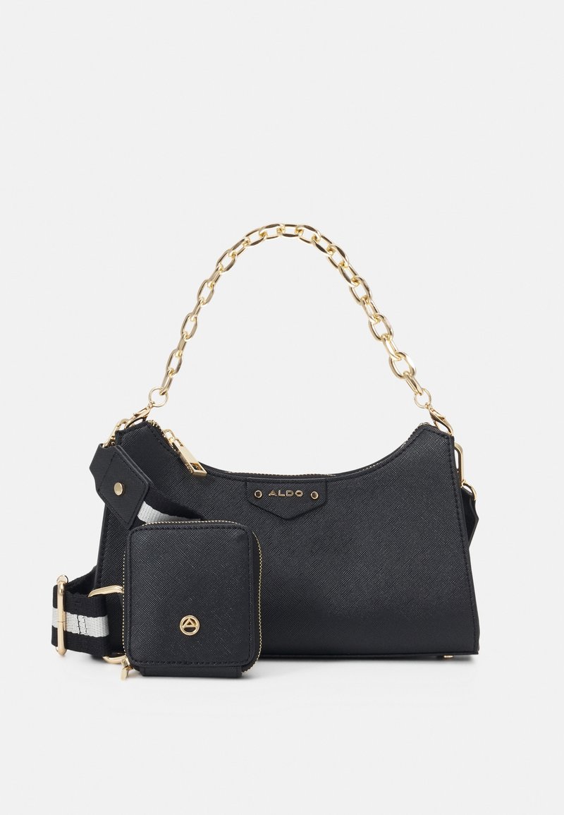 Sac à main noir texturé avec poignée chaîne dorée, petite pochette amovible avec fermeture éclair, et sangle rayée noire et blanche ajustable.
