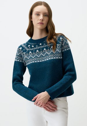 Maglione lavorato a maglia color teal con un colletto decorato in bianco e beige, polsini a coste e un design corto. Tessuto liscio con maniche lunghe.