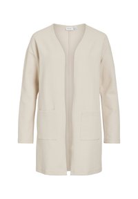 Μπεζ ζακέτα με χαλαρή εφαρμογή, κατασκευασμένη από υφή ύφασμα. Διαθέτει μακριά μανίκια και δύο εμπρόσθιες τσέπες. Σχεδια σμός ανοιχτού μπροστινού μέρους χωρίς κλεισίματα.