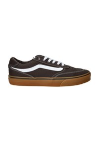 Bruine canvas sneakers met witte accenten en veters. Heeft een witte zijstreep en een rubberen gum-ondergrond. Ronde neus en contrasterende stikseldetails.