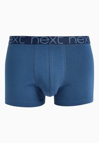 Blå bomullskalsonger med en något figurnära design, med ett marinblått elastiskt midjeband med "next"-logotyp i ljusblått.