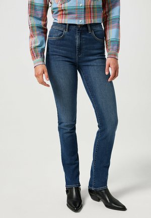- Jeansy Slim Fit
