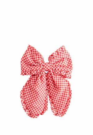 Red and white gingham check fabric bow with ruffled edges on a white background.