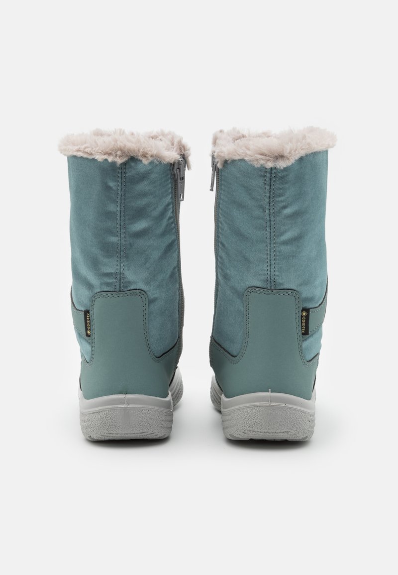 Wasserfeste türkisfarbene Stiefel mit einem weichen Kunstfellkragen, seitlichen Reißverschlüssen und strukturierten Gummisohlen, die eine verstärkte Ferse für Unterstützung bieten.