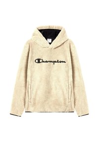 Sudadera de felpa beige con un logo negro de "Champion", que cuenta con una capucha grande, bolsillos frontales y ribetes negros en los puños y el dobladillo.