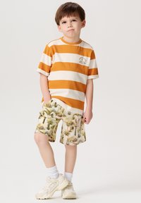 Noppies DELTAVILLE - Print T-shirt - whisper white