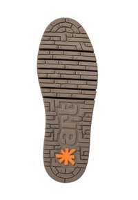 Suela de zapato de goma marrón con un patrón de textura en la parte inferior. Presenta un elemento de diseño central en color naranja con forma de asterisco.