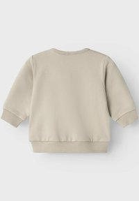 Felpa beige con scollatura rotonda, polsini a coste e orlo. Texture morbida e design semplice, con una vista posteriore liscia.