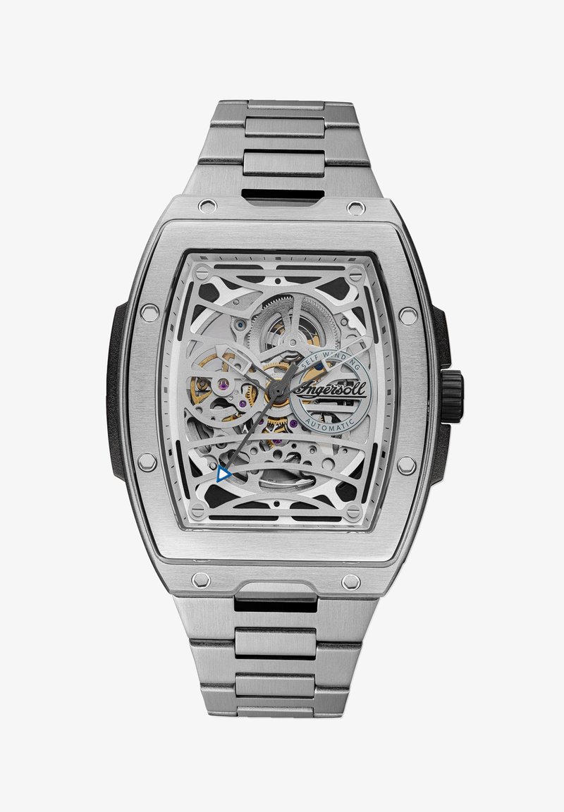 Vastschriftin van roestvrij staal met een vierkante wijzerplaat, transparante wijzerplaat die complexe tandwielen onthult, blauwe en zilveren accenten, en een schakelarmband.