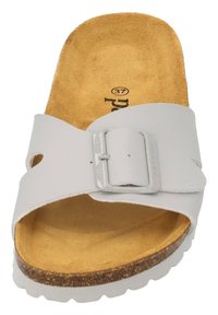 Sandal bianchi a scivolo con fibbia, dotata di una tomaia in pelle martellata e un sottopiede in suede beige. Sottopiede in sughero marrone e suola bianca. Taglia 37.