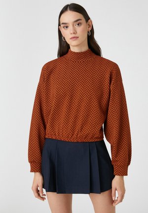 - Sweter