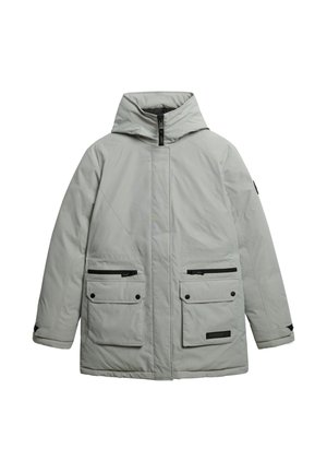 Giacca isolante grigia chiara con cappuccio, caratterizzata da dettagli in zip nera, due tasche frontali e un taglio dritto.