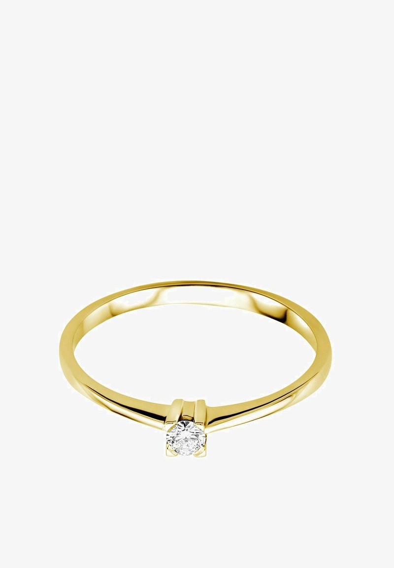Zlati prstan z majhnim okroglo diamantom, nastavljenim v minimalističnem štiriprvem nastavku, s gladko, polirano obročkom in elegantnim dizajnom.
