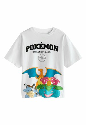 White short-sleeve t-shirt featuring colorful Pokémon graphic, including Charizard, Blastoise, and Venusaur, with black text above.