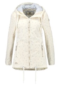 Ljusbeige huvjacka med små marinblå ankare och knoppar mönster, framdragkedja, dragkedjefickor på sidorna, och justerbara dragsnören i nederkant och huva.