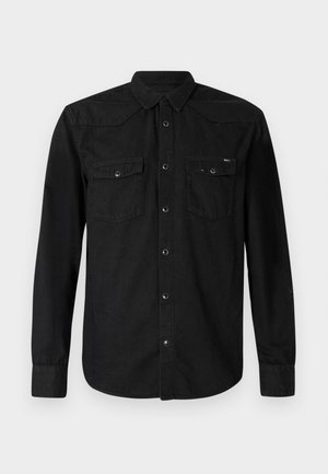 Zwarte lange mouw shirt van katoen met een knoopsluiting aan de voorkant, twee borstzakken en een puntige kraag. Kenmerkt zich door contrasterende knoopaccenten.
