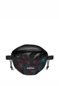 Musta pussukkakäynti, jossa on värikkäitä lehtikuvioita, vetoketjukiinnitys ja kangaspanta. Sisäpuoli on vuorattu sileällä mustalla materiaalilla.