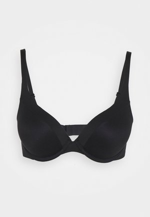 Black padded bra with adjustable straps, smooth matte texture, underwire support, and a cut-out detail at the center of the band.