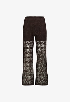 Schwarze Spitzenhose mit Blumenmuster, hoher Taille, oben eng anliegend und ausgestellte Beine mit durchsichtiger Spitze von der Mitte des Oberschenkels abwärts.