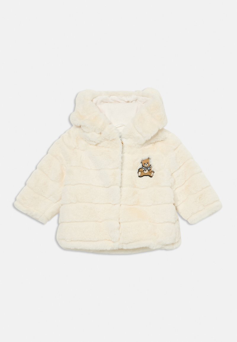 Λευκό φούτερ με γούνα, με κουκούλα και οριζόντιες ρίγες, διαθέτει κέντημα μίνι αρκουδάκι στην αριστερή πλευρά του στήθους. Μαλακή υφή, κοντά μανίκια.