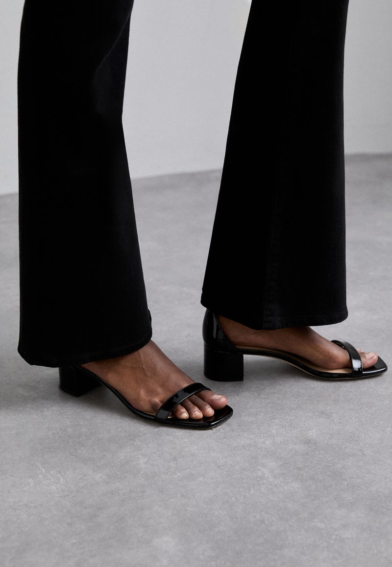 Stuart Weitzman NUDISTCURVE - Sandaalit nilkkaremmillä - black