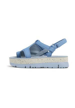 Blue platform sandals with multiple straps, made from a smooth material. The sole is light gray with speckled texture and a thick, cushioned base.