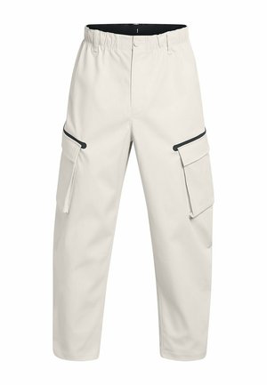 Pantalons cargo beiges fabriqués en tissu lisse, dotés d'une taille élastique, de deux poches latérales et de détails en noir.