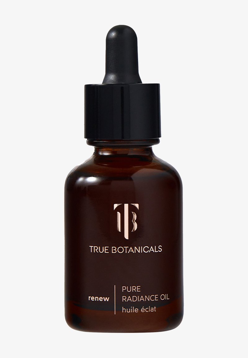 Bruine glazen fles met een zwarte druppeldop, versierd met gouden tekst. De container bevat True Botanicals Pure Radiance Oil.
