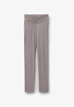 Hellgraue Leggings mit hohem Bund und V-förmigem Taillenbund-Detail, aus glattem Stretchstoff, flach auf weißem Hintergrund liegend.