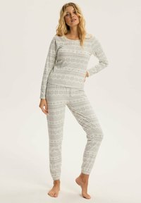 Szary zestaw piżamowy z wzorem, składający się z długiego rękawa i zwężanych spodni, wykonany z miękkiego materiału z geometrycznymi wzorami i motywami płatków śniegu.