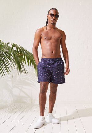 PATTERN - Swimming shorts - dark blue/pink