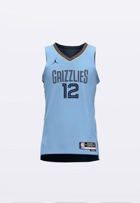 Lyseblå basketballtrøye med svarte detaljer, med "GRIZZLIES" i fet skrift, nummer "12" og en mønstret krage.