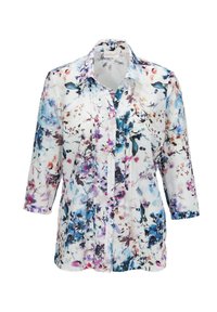 Blumige Bluse mit Knopfleiste und Dreiviertelärmeln. Hergestellt aus leichtem Stoff, mit einem weißen Grundton und blauen, lila und pinken Blumenmustern.