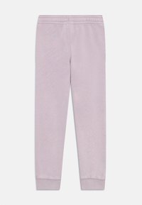 Hellblau Sweatpants aus weichem Stoff, mit elastischem Bund und schmal zulaufenden Bündchen an den Knöcheln.