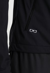ION Chaqueta softshell - black
