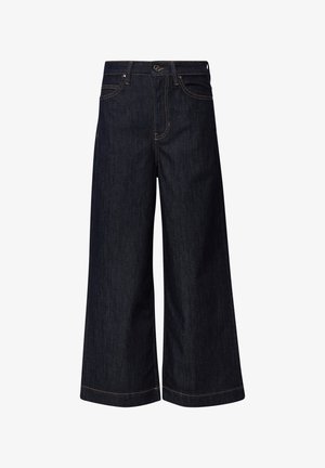 Dunkelblaue weit geschnittene Jeans aus Denim. Zu den Merkmalen gehören ein Knopf- und Reißverschluss, fünf Taschen und kontrastierende gelbe Nähte.