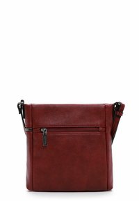 Red leather crossbody bag with a smooth texture, rectangular shape, and a front zip pocket. Features an adjustable strap and metallic accents.
